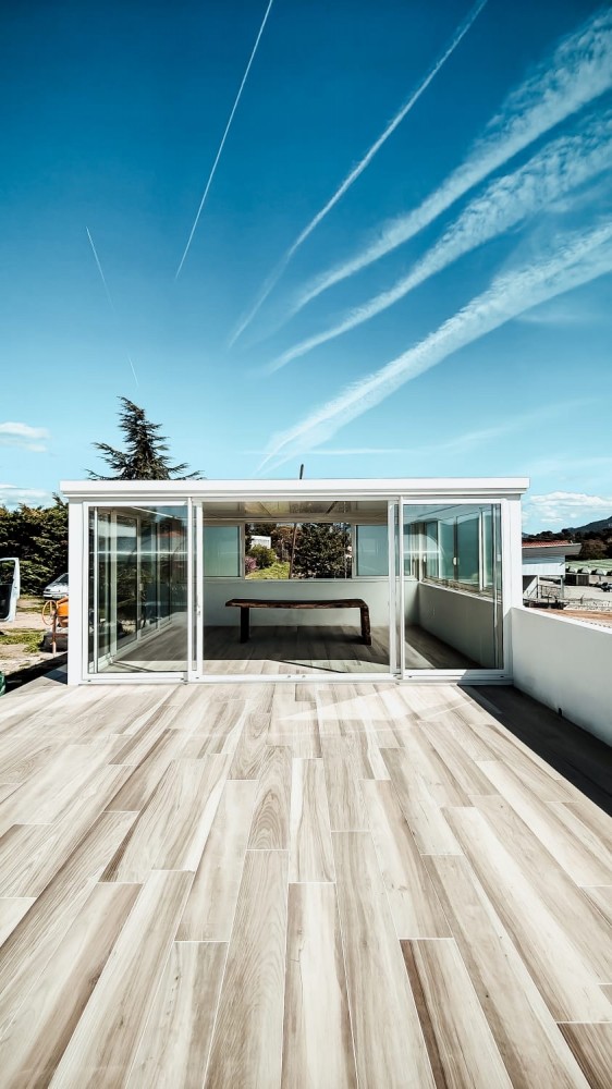 Installation d'une veranda Blanche avec Châssis de dimension 6000x5000 à Aubagne